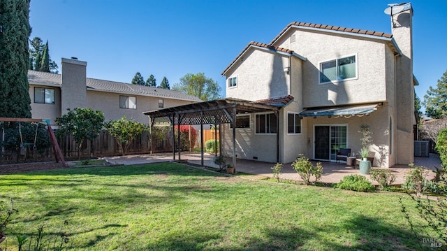 back of house with a fenced backyard, a lawn, stucco siding, a pergola, and a patio area