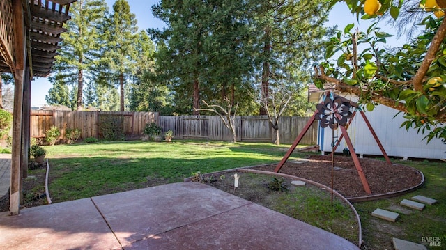 view of yard with a fenced backyard and a patio