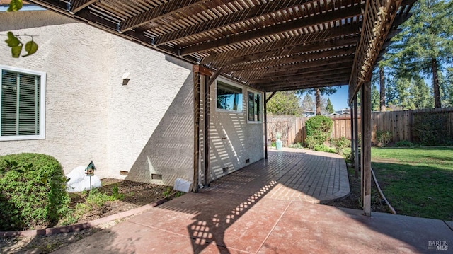 view of patio / terrace with fence and a pergola