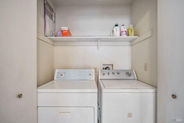 laundry room featuring laundry area and washing machine and dryer