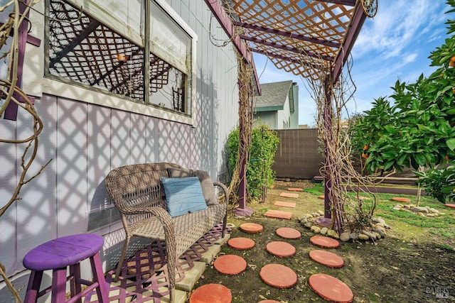 view of patio with fence