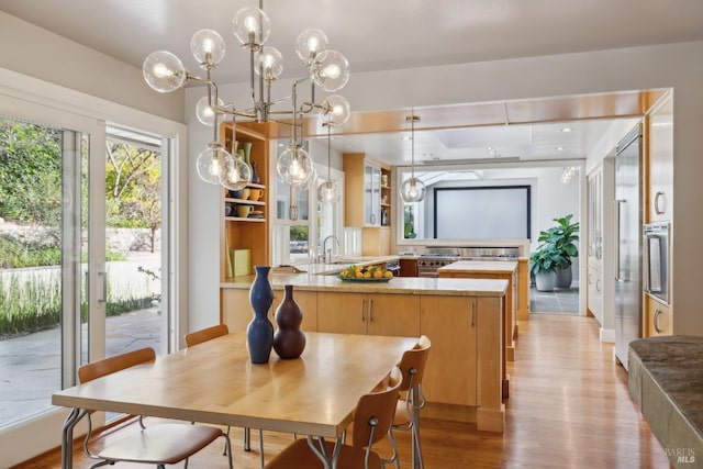 dining space with light wood finished floors