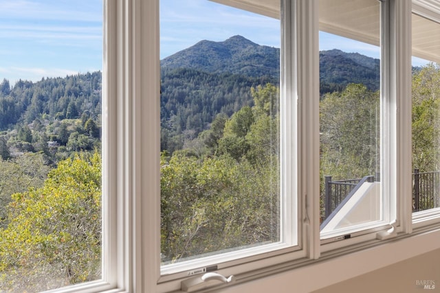 room details with a mountain view and a view of trees