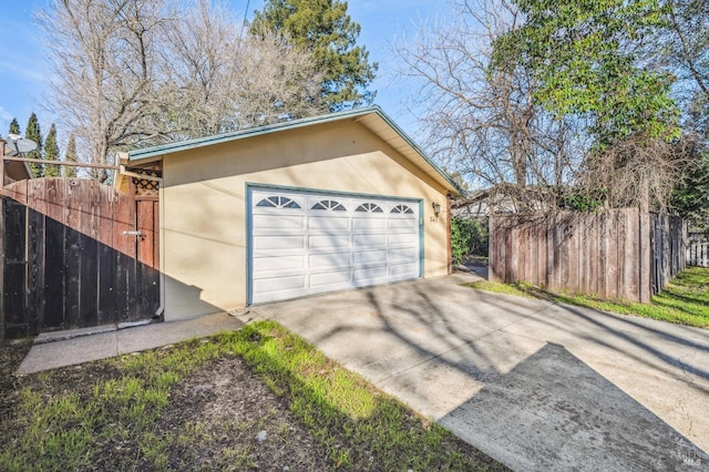 detached garage with fence