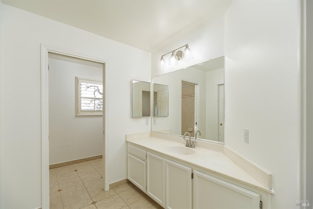 bathroom featuring tile patterned floors and vanity