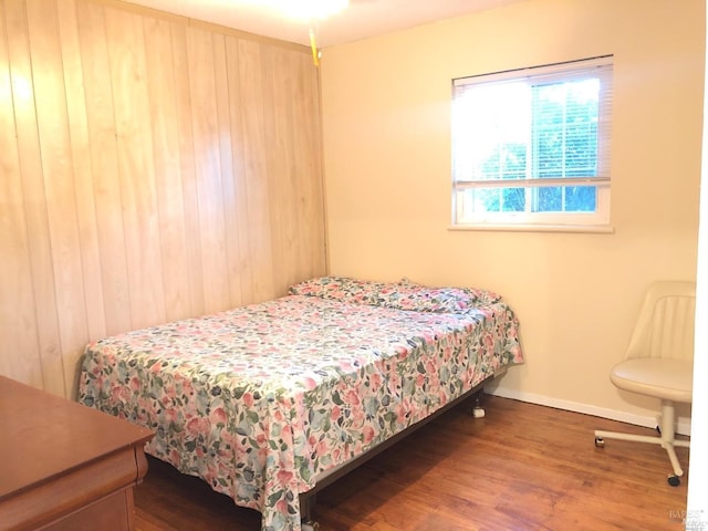 bedroom featuring hardwood / wood-style floors