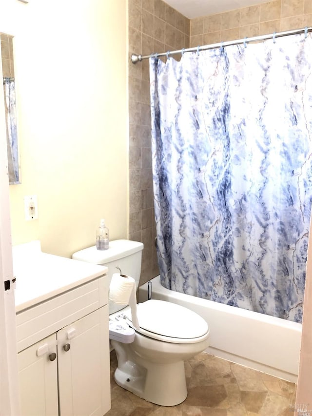 full bathroom featuring shower / bathtub combination with curtain, vanity, toilet, and tile patterned flooring