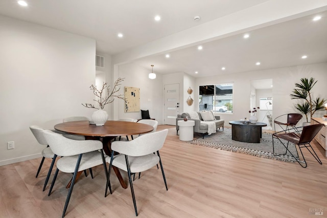 dining space with recessed lighting, visible vents, light wood-style flooring, and baseboards