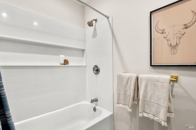 bathroom featuring shower / tub combo with curtain