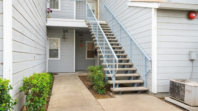 doorway to property with central AC unit