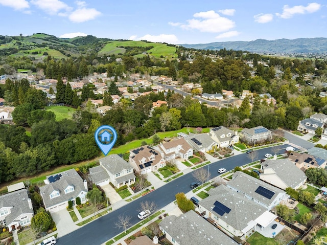 drone / aerial view with a residential view and a mountain view