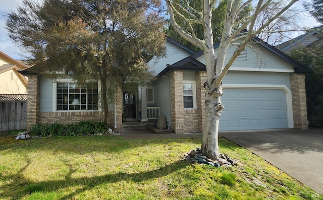 view of front of property with a garage and a front yard