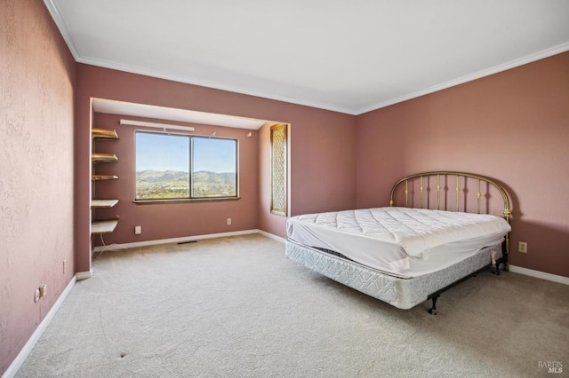 bedroom featuring light colored carpet, crown molding, visible vents, and baseboards