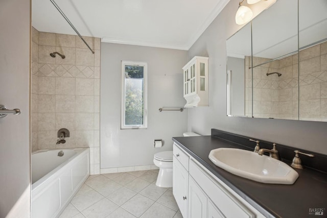 bathroom with shower / tub combination, toilet, vanity, tile patterned floors, and crown molding