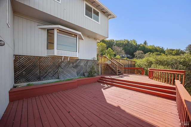 wooden terrace featuring stairway