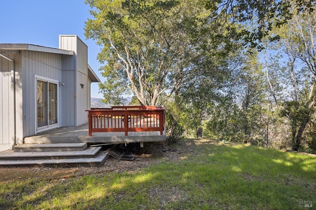 view of yard with a wooden deck