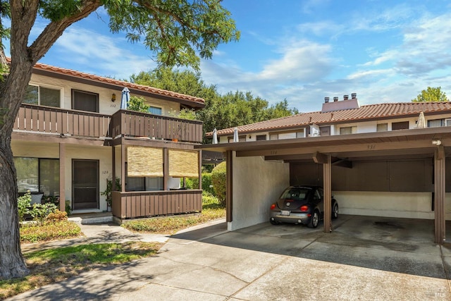 view of parking with a carport