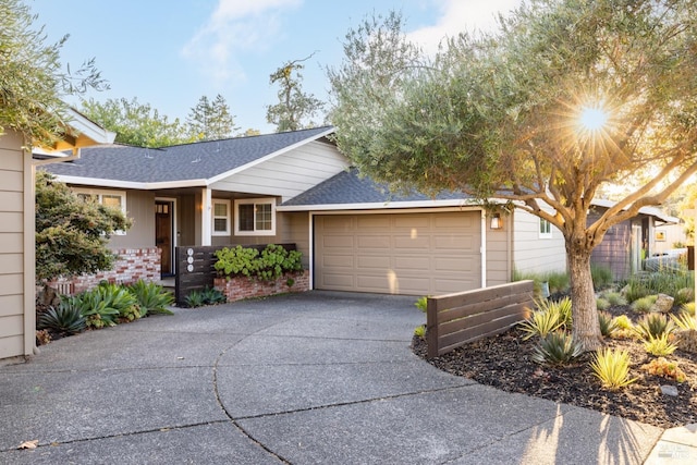 single story home featuring a garage