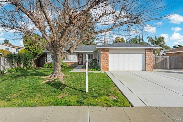 ranch-style home with a front lawn and a garage