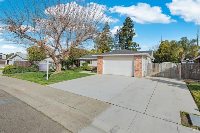 single story home featuring a garage and a front lawn