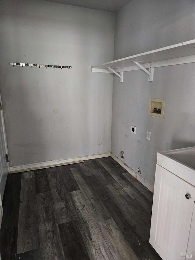 laundry area with laundry area, gas dryer hookup, wood finished floors, hookup for an electric dryer, and washer hookup