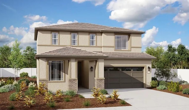 view of front of home with a garage