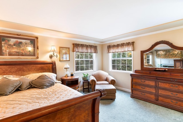 bedroom featuring baseboards, carpet flooring, and ornamental molding