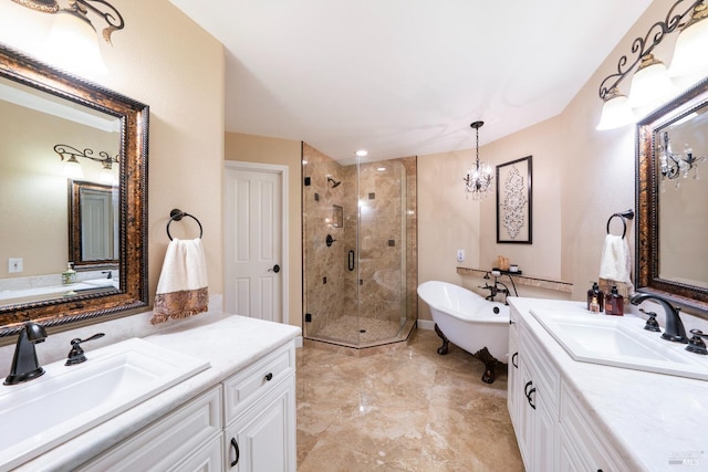 full bath featuring a stall shower, a freestanding bath, a sink, and two vanities