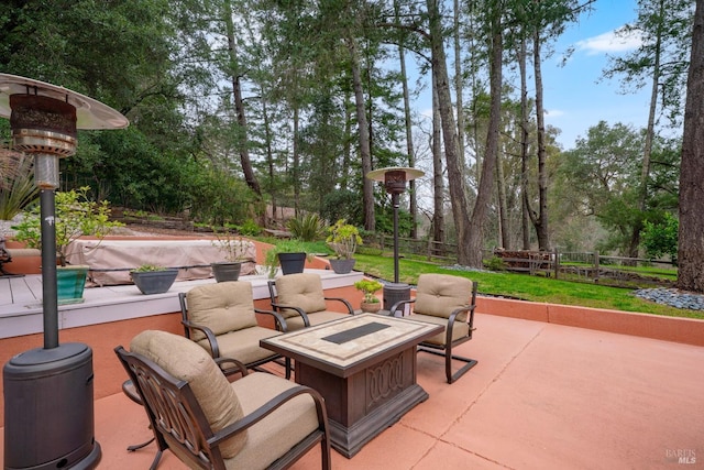 view of patio featuring fence