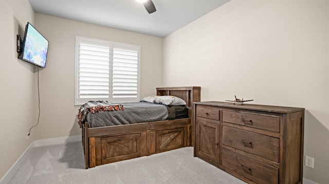 bedroom featuring carpet, ceiling fan, and baseboards