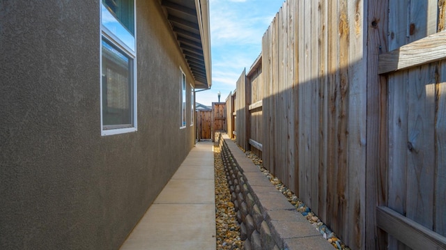 955 Vasey St, Winters, CA 95694 - view of side of home with stucco siding and fence