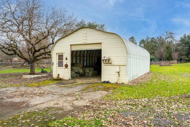 garage with a lawn