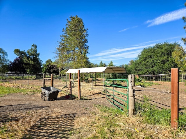 8100 Pinecrest Dr, Redwood Valley, CA 95470 - view of yard featuring a gate, fence, and a view of rural / pastoral area