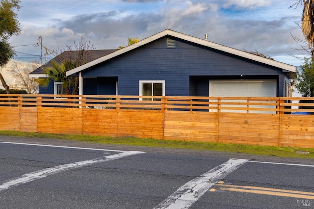 exterior space featuring a garage