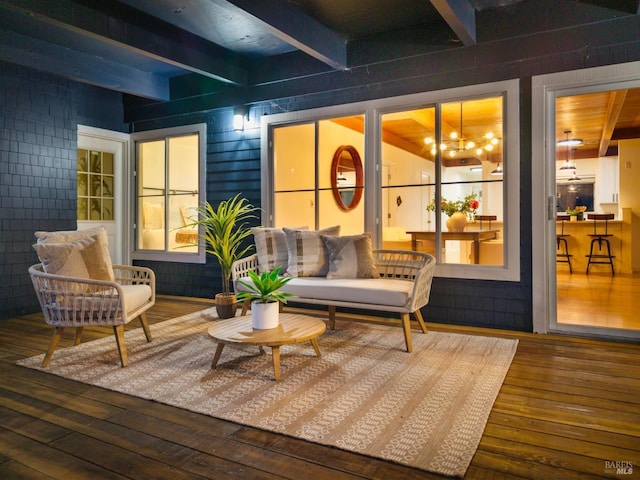 wooden terrace featuring an outdoor living space