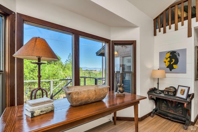 interior details with wood finished floors and baseboards