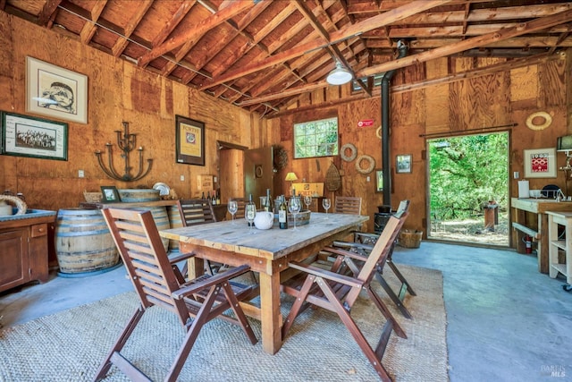 dining room featuring lofted ceiling