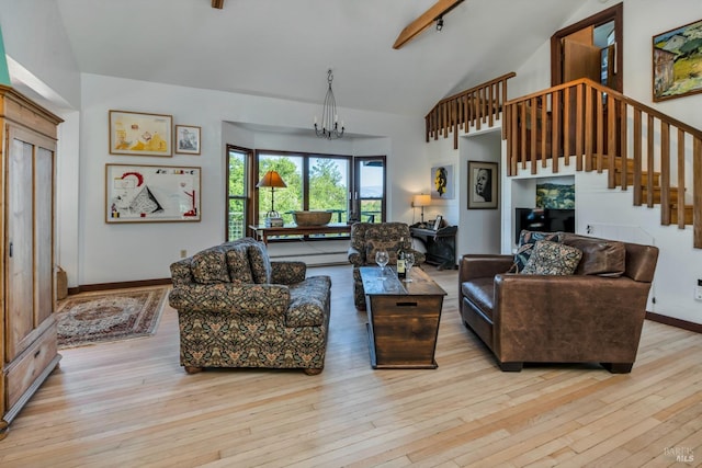 living room with baseboards, a chandelier, stairs, and light wood finished floors