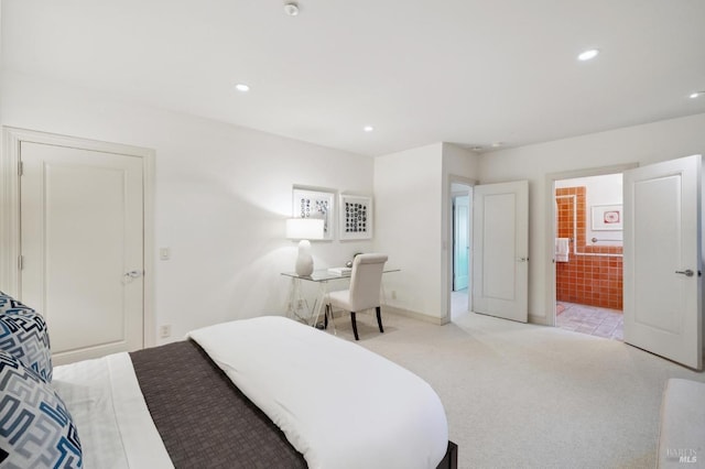 bedroom featuring light carpet, baseboards, connected bathroom, and recessed lighting