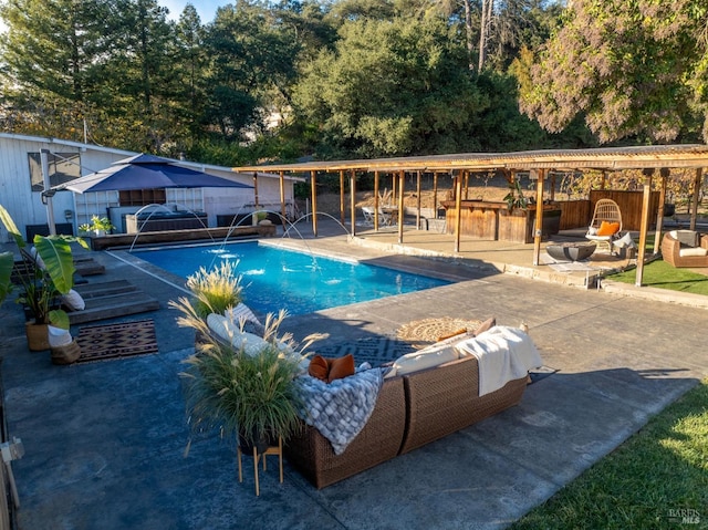 pool with a patio area and outdoor lounge area