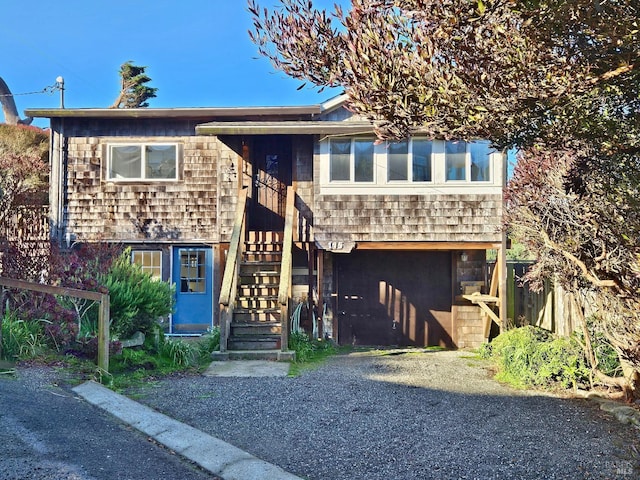 view of front of property with stairs