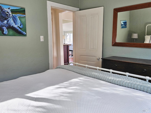 bedroom with a textured wall