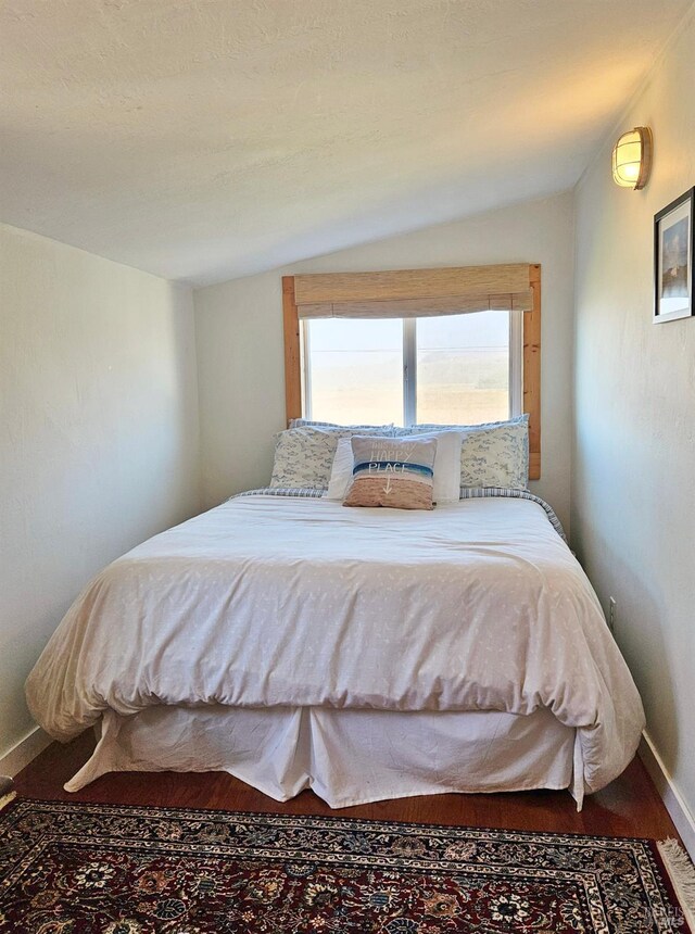 195 Ocean View Ave, Bodega Bay, CA 94923 - bedroom with baseboards and wood finished floors