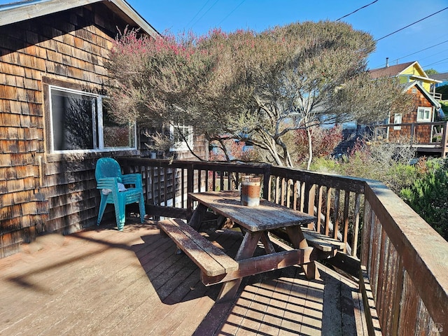 deck featuring outdoor dining area