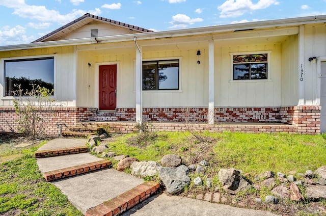 view of front of property with brick siding