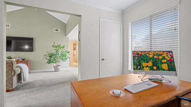 office area with crown molding, light colored carpet, visible vents, vaulted ceiling, and baseboards