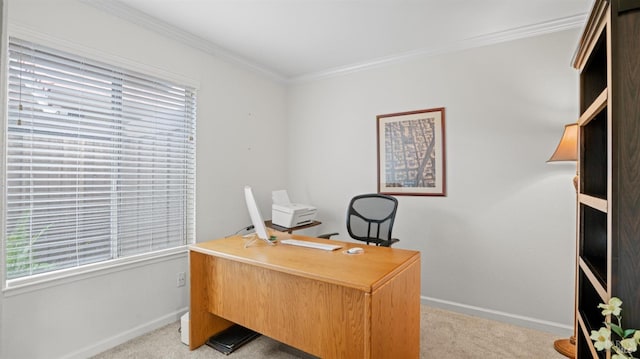 office area with baseboards, ornamental molding, and light colored carpet