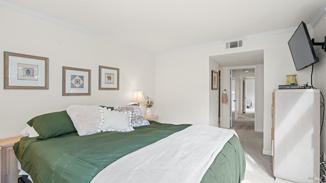 bedroom featuring light carpet, baseboards, visible vents, and crown molding