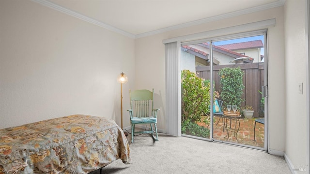 carpeted bedroom featuring access to outside, ornamental molding, and baseboards