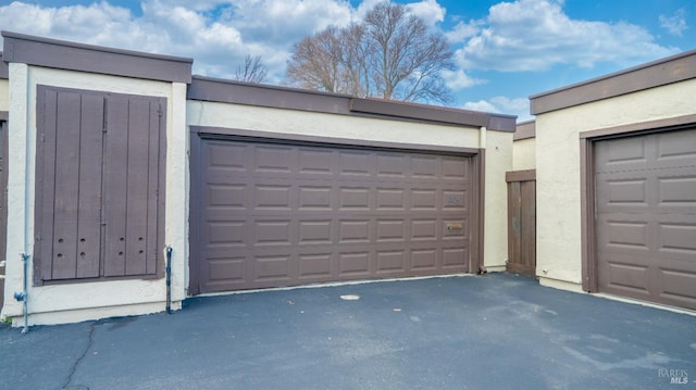 garage with driveway